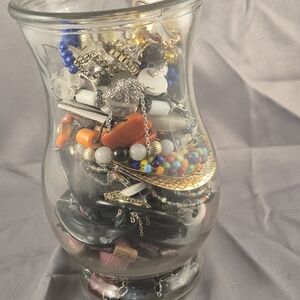 Colorful Jewelry Assortment in Glass Vase